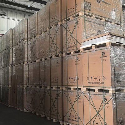 Solar panels on pallets in the HBOWA warehouse ready for bulk shipment